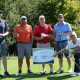 Cordeck foursome golfing at Tee Up Fore the Cure 2017